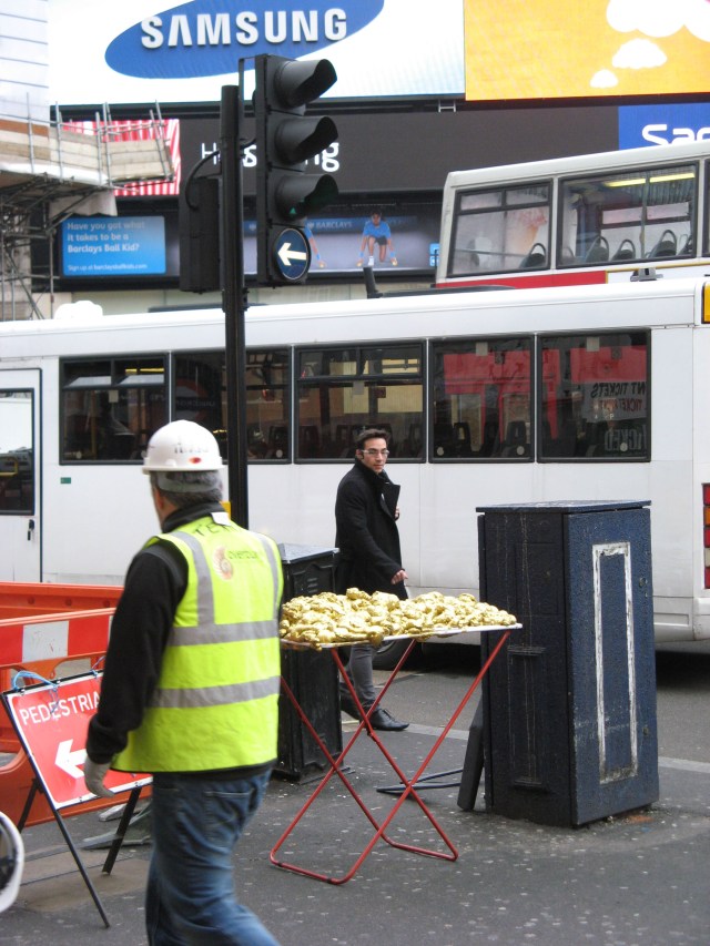 © Renate Egger and Wilhelm Roseneder. Goldene Erweiterung/Golden expansion. Street art project. Piccadilly Circus. London, UK  2010